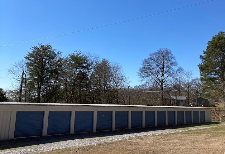 Row of drive-up storage units at Storage Park Etowah North